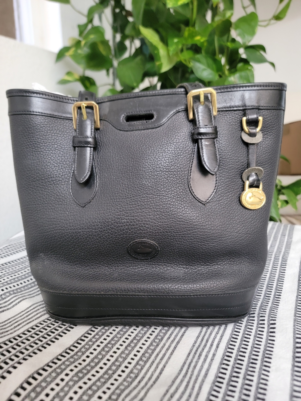 Dooney and Bourke Classic Black Leather Tote with Gold Accent